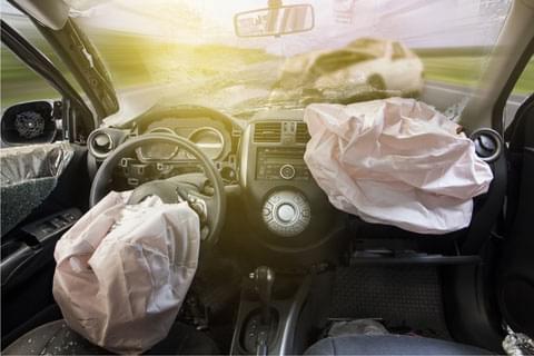 Inside of a car with deployed airbags 